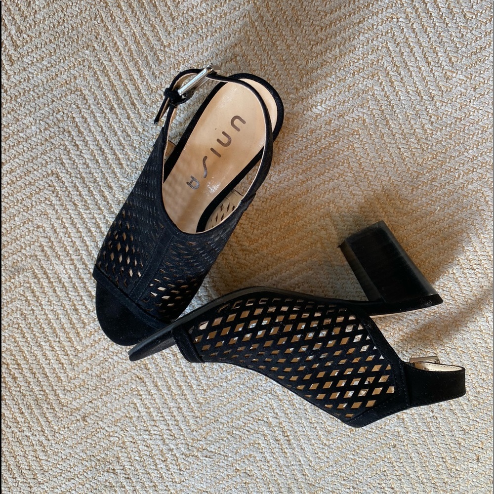 Black sling back open toe shoe